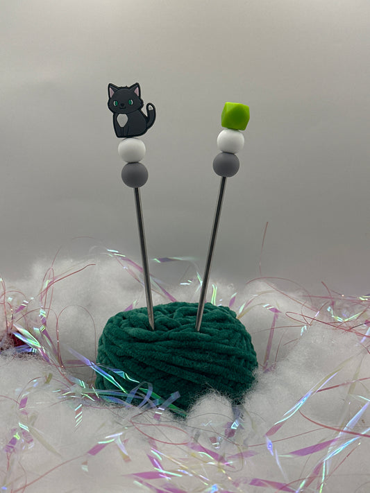 Schwarz weiße Katze Ami-Stick